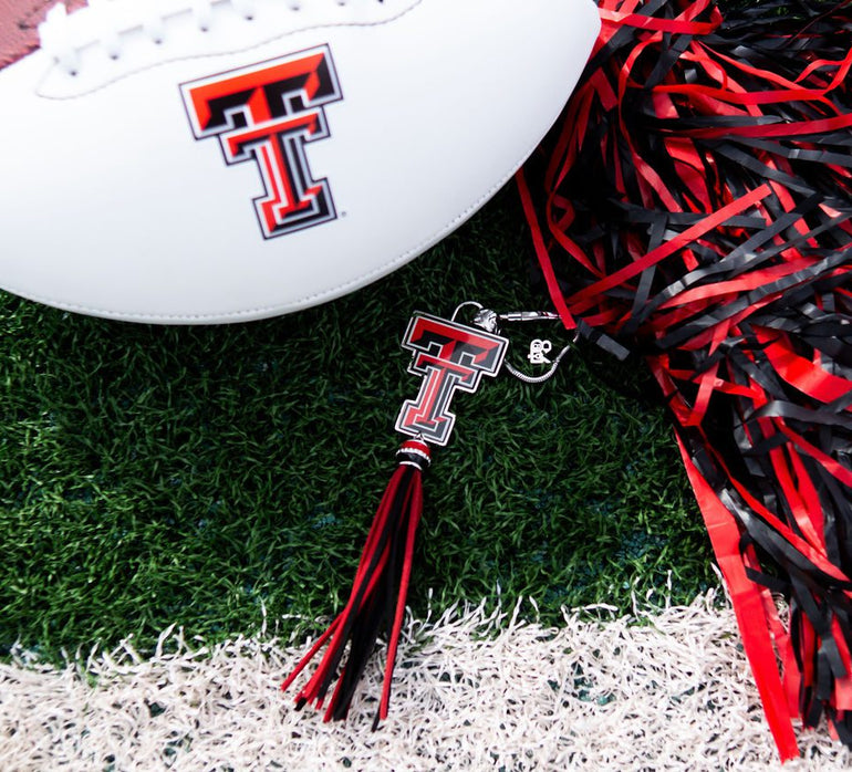 Football with Texas Tech logo and keychain.