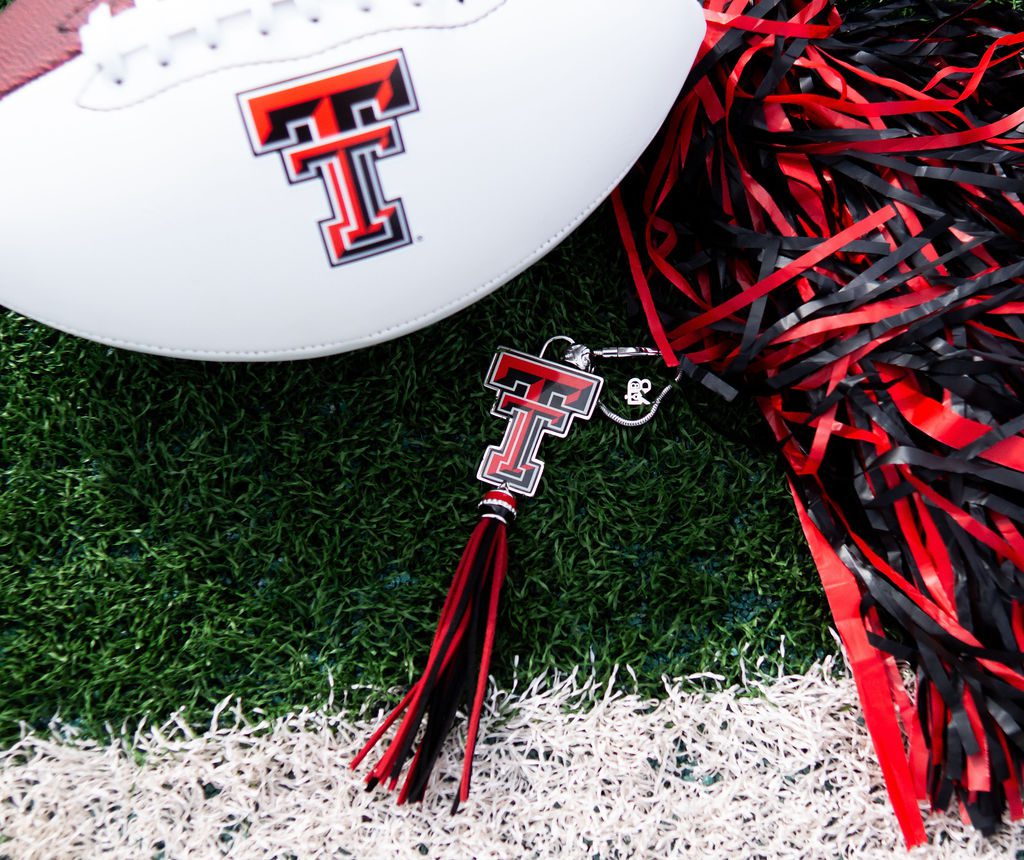 Football with Texas Tech logo and keychain.